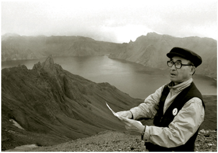 1998. reading a poem at the Chn-ji(heaven lake), Mt. Paekdu, North Korea